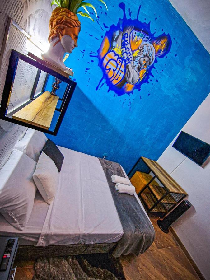 Urban Hostal Bar บูการามังกา ภายนอก รูปภาพ